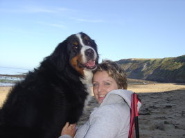 Amy and Philippa having a cuddle on Runswick Bay Beach, North Yorkshire