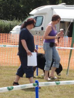 Debbie Brewer working her Merlin in Obedience